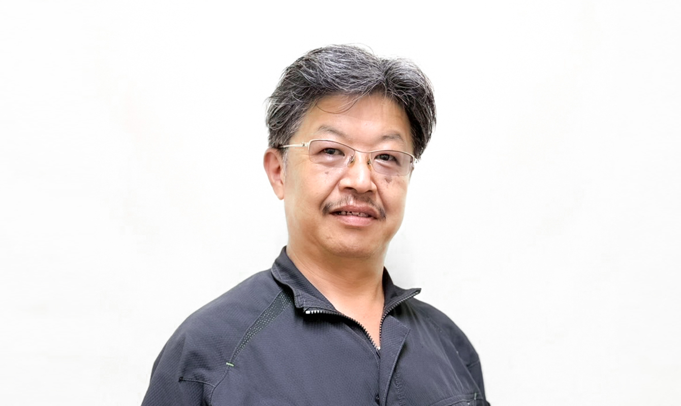 ビジネス統括本部 品質管理部　プロフェッショナル 大里 健司